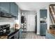 Well-equipped kitchen with modern appliances, storage solutions, and eat in space at 4414 Winthrop Ave, Indianapolis, IN 46205
