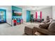 Spacious game room featuring a comfortable couch, pool table, and television with modern decor at 4434 W Windsong Ct, New Palestine, IN 46163