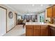 Kitchen island view with a connection to dining and living room at 4434 W Windsong Ct, New Palestine, IN 46163