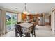 Eat-in kitchen with tile floors and stainless steel appliances at 4434 W Windsong Ct, New Palestine, IN 46163
