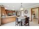Eat-in kitchen with tile floors and stainless steel appliances at 4434 W Windsong Ct, New Palestine, IN 46163