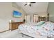 Primary bedroom with a vaulted ceiling, and dressers and scenic outdoor views at 4434 W Windsong Ct, New Palestine, IN 46163