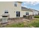 Outdoor patio features a grill and dining area for entertaining guests and enjoying outdoor meals at 4434 W Windsong Ct, New Palestine, IN 46163