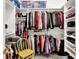 Walk-in closet with custom shelving and ample storage space for clothes and accessories at 4530 Chase Oak Ct, Zionsville, IN 46077