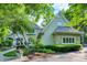 Charming two-story home featuring stone accents, lush landscaping, and a welcoming front porch at 4530 Chase Oak Ct, Zionsville, IN 46077