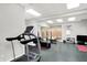 Well-equipped home gym with treadmill, weights, and boxing equipment, offering a complete fitness solution at 4530 Chase Oak Ct, Zionsville, IN 46077
