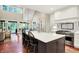 Bright kitchen with island seating, stainless appliances, and open floorplan at 4530 Chase Oak Ct, Zionsville, IN 46077