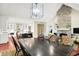Open kitchen featuring an island and eat-in kitchen, connecting to a dining area and living room at 4530 Chase Oak Ct, Zionsville, IN 46077