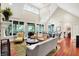 Open living area with high ceilings, fireplace, and ample natural light at 4530 Chase Oak Ct, Zionsville, IN 46077