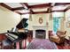 Bright living room with fireplace, hardwood floors, and natural light at 4530 Chase Oak Ct, Zionsville, IN 46077