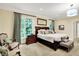 Comfortable primary bedroom with lots of natural light and a neutral color scheme at 4530 Chase Oak Ct, Zionsville, IN 46077