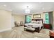 Spacious main bedroom with carpet, a large bed, and windows providing ample natural light at 4530 Chase Oak Ct, Zionsville, IN 46077