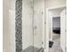 Updated bathroom with a glass-enclosed shower and decorative tile at 4530 Chase Oak Ct, Zionsville, IN 46077