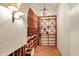 Custom wine cellar with ample storage and elegant lighting at 4530 Chase Oak Ct, Zionsville, IN 46077