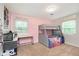 Adorable bedroom with a gray bunk bed, a desk near the window, and neutral toned carpeting at 4840 E 77Th St, Indianapolis, IN 46250
