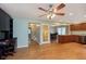 Open concept living room with view to dining area and kitchen with built-in desk at 4840 E 77Th St, Indianapolis, IN 46250