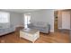 Bright and airy living room with hardwood floors, a neutral color palette, and comfortable sofas at 4840 E 77Th St, Indianapolis, IN 46250