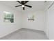 Bright bedroom featuring carpet, closet, and natural light from a window at 5982 Melbourne Rd, Indianapolis, IN 46228