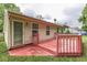 A well-maintained deck offers an inviting outdoor space for relaxation and enjoying the backyard view at 6010 Rocky River Dr, Indianapolis, IN 46221
