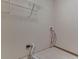 Laundry room featuring tile flooring and washer hookups at 6010 Rocky River Dr, Indianapolis, IN 46221