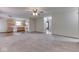 The open-concept living room seamlessly connects to the kitchen, perfect for modern living and entertaining at 6010 Rocky River Dr, Indianapolis, IN 46221
