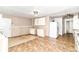 A kitchen needing repair with white cabinets and a linoleum floor at 6238 E 43Rd St, Indianapolis, IN 46226