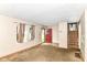 Vacant living room with carpet and a view of the front door at 6238 E 43Rd St, Indianapolis, IN 46226