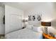 Bright bedroom offers a serene ambiance with an abundance of natural light and ample storage at 6415 Calabash Pl, Indianapolis, IN 46217