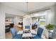Bright eat-in dining area with sliding door access to a deck with outdoor seating at 6415 Calabash Pl, Indianapolis, IN 46217