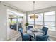 Bright eat-in dining area with sliding door access to a spacious outdoor deck at 6415 Calabash Pl, Indianapolis, IN 46217