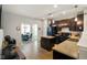 Well-lit kitchen features a kitchen island, stainless steel appliances, and an eat-in dining area at 6415 Calabash Pl, Indianapolis, IN 46217