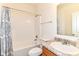 Bright and clean bathroom featuring a shower/tub combination and a vanity sink at 6556 Sulgrove Pl, Indianapolis, IN 46221