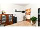 Bright room with storage and a view into the kitchen through a stylish sliding barn door at 6556 Sulgrove Pl, Indianapolis, IN 46221