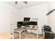 Spacious home office featuring multiple monitors and ample workspace for productivity at 6556 Sulgrove Pl, Indianapolis, IN 46221