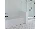 Clean white bathroom featuring a soaking tub and glass-enclosed shower at 6771 W Buck Stone Dr, McCordsville, IN 46055
