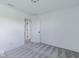 Neutral carpet with white walls, trim, and doors are showcased in this bright bedroom featuring convenient doorway access at 6771 W Buck Stone Dr, McCordsville, IN 46055