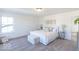 Cozy bedroom with soft carpet, natural light, and stylish modern accents at 6771 W Buck Stone Dr, McCordsville, IN 46055