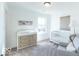 Comfortable Bedroom with neutral tones, natural light, changing table, and a crib at 6771 W Buck Stone Dr, McCordsville, IN 46055