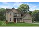 New construction, two-story home with a two-car garage, and professionally landscaped yard at 6771 W Buck Stone Dr, McCordsville, IN 46055