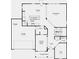 Open-concept floor plan featuring kitchen, dining area, great room, and a two-car garage at 6771 W Buck Stone Dr, McCordsville, IN 46055