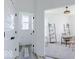 Well-lit home office featuring sleek wood floors, neutral paint, and modern fixtures at 6771 W Buck Stone Dr, McCordsville, IN 46055