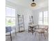 Bright home office space with a large window, a desk, and comfortable seating at 6771 W Buck Stone Dr, McCordsville, IN 46055