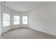 Bright bedroom with neutral carpet, large windows, and fresh, white walls at 7128 Willow Pond Dr, Noblesville, IN 46062