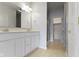 Main bathroom features dual sink vanity, neutral paint, and walk-in shower at 7128 Willow Pond Dr, Noblesville, IN 46062