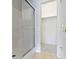 Main bathroom shower with glass doors and access to the walk-in closet at 7128 Willow Pond Dr, Noblesville, IN 46062