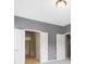 Main bedroom featuring ensuite bathroom and walk-in closet access, neutral paint, and carpet floors at 7128 Willow Pond Dr, Noblesville, IN 46062