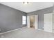 Main bedroom featuring neutral paint, carpet floors and ensuite bathroom access at 7128 Willow Pond Dr, Noblesville, IN 46062