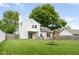Large backyard features a firepit, deck and pergola, perfect for outdoor entertaining at 7541 Southern Lakes Dr, Indianapolis, IN 46237