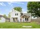 Spacious backyard featuring a deck, patio, shed, and well-maintained lawn at 7541 Southern Lakes Dr, Indianapolis, IN 46237