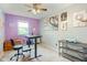 Bedroom features a ceiling fan, carpeted floors, and two-tone paint at 7541 Southern Lakes Dr, Indianapolis, IN 46237